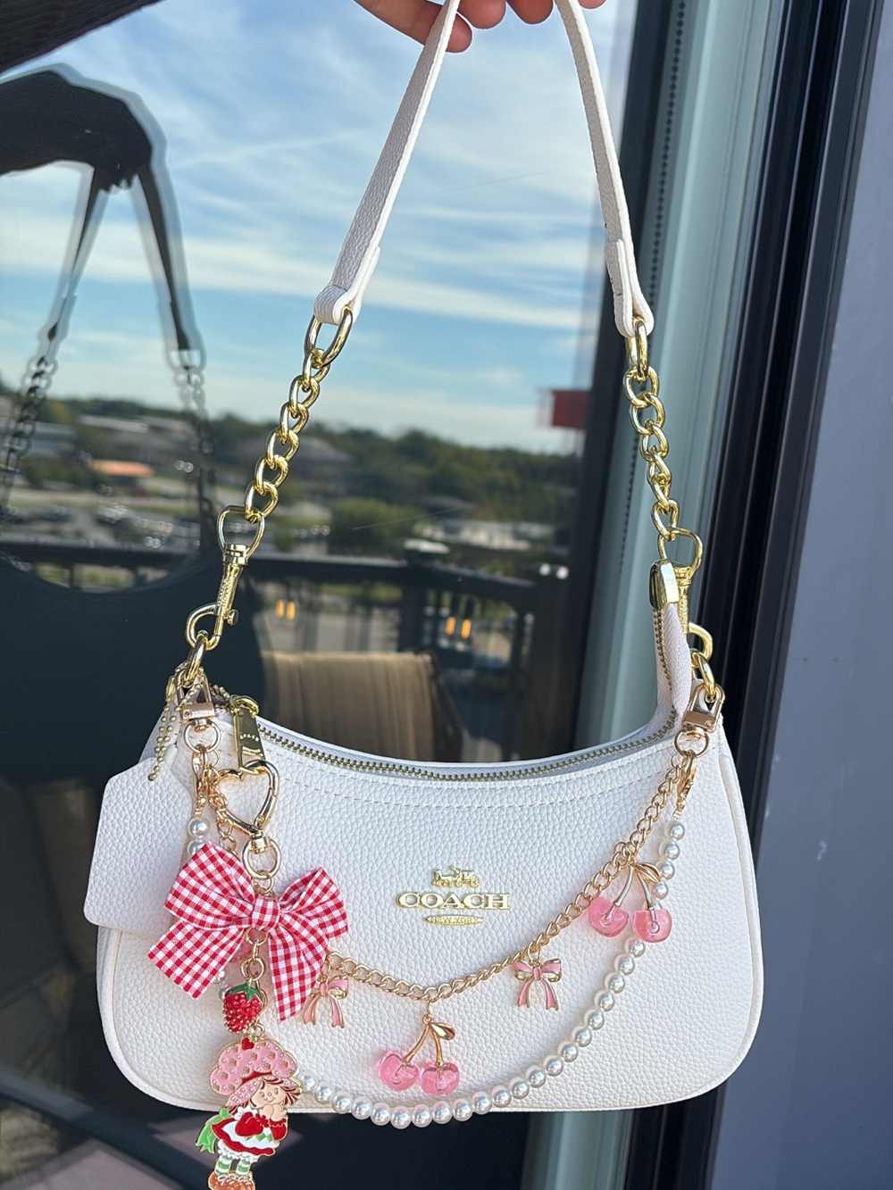 Coach White Shoulder Bag with Gold Chain and Charm